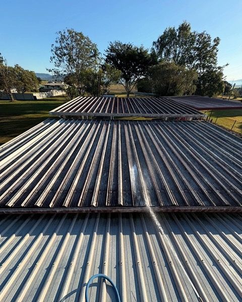 A corrugated metal roof seen along its length